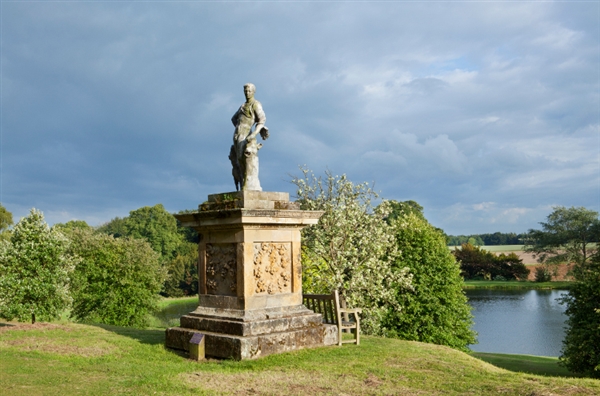 Statue lined lakeside terrace