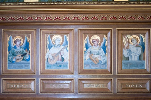 Painted panelling depicting religious figures.